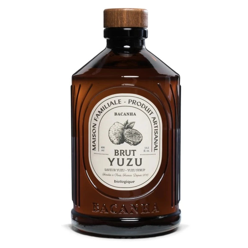Sirop brut de yuzu parfait pour les cocktails présenté dans beau flacon en verre brun au look vintage