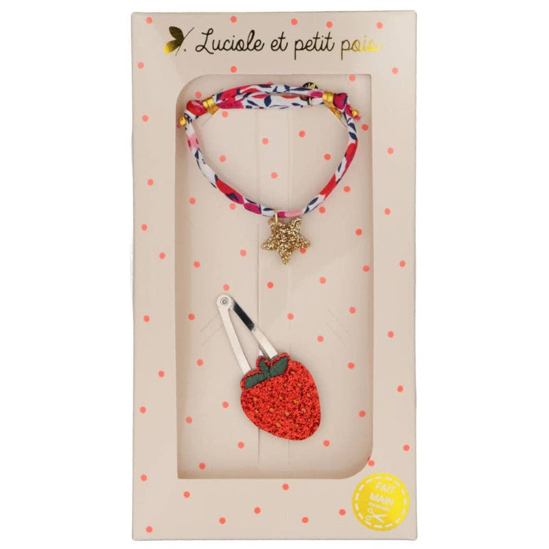 coffret comprend une barrette fraise (pince clic clac 5 cm) et un bracelet Liberty Wiltshire rouge d'une étoile dorée
