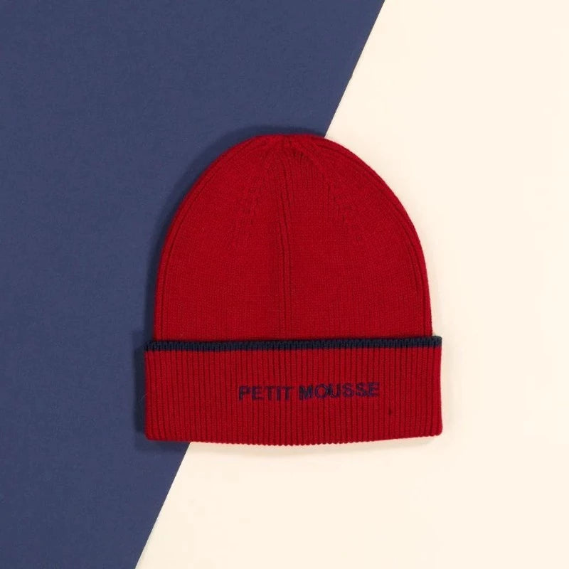 Bonnet Petit Mousse Chamaye. bonnet pour enfant en coton biologique. Coloris cerise et liseré marine.