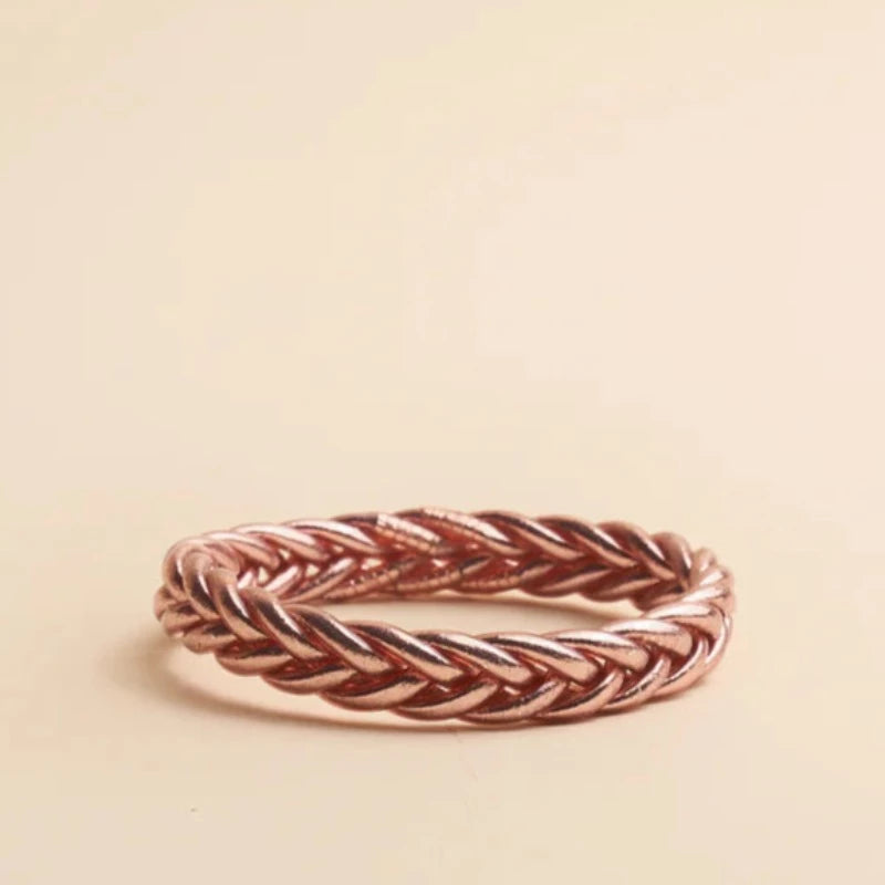 Bracelet Kumali tressé rose de Shan Shan Paris. Modèle : tressé Coloris : or, argent, champagne, rose Diamètre intérieur taille S : 5,5 cm - tour de poignet : 14 cm Diamètre intérieur taille M : 6,5 cm - tour de poignet : 16 cm Diamètre intérieur taille L : 7,5 cm - tour de poignet : 18 cm L'épaisseur du bracelet est de 1,2 cm