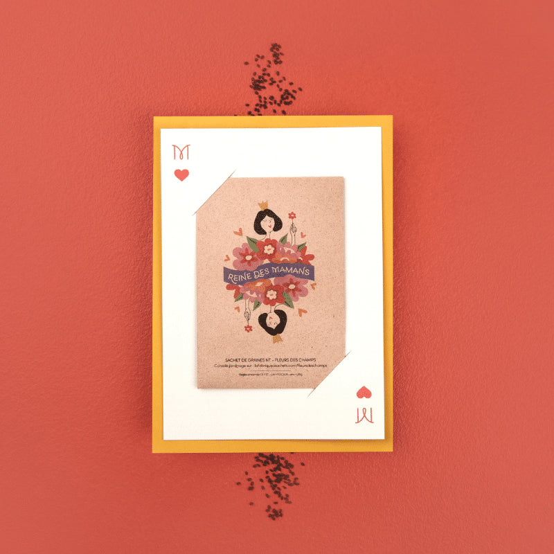 Notre carte à faire pousser, Fête des Mères, célèbre la reine de votre vie : votre maman. Son illustration fleurie, colorée et joyeuse s’inspire des jeux de cartes traditionnels. Et votre maman en est le personnage principal ! Une reine de beauté, d’intelligence, d’affection et de tendresse. Elle se compose : Un sachet en papier kraft contenant des graines biologiques de fleurs des champs Une carte de correspondance Une enveloppe jaune