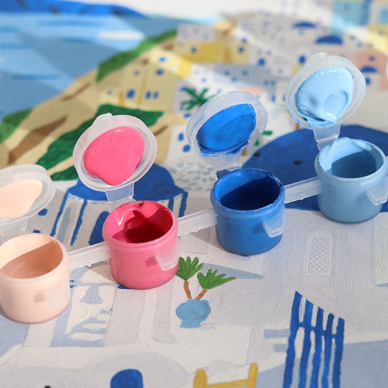 La Petite Épicerie a imaginé spécialement pour vous une jolie série de peinture au numéro, Petit pinceau. Elle vous propose cette peinture Santorini, conçue par l'illustratrice Maja Tomljanovic. Le coffret est 100% Made in France. A vos pinceaux !