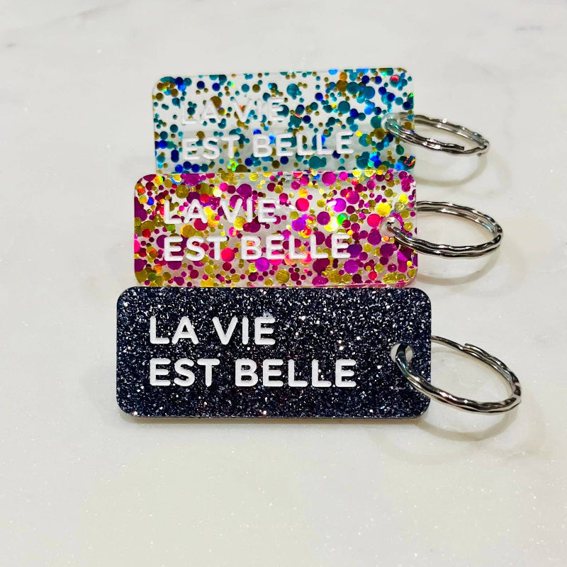 LA VIE EST BELLE Porte-clés à paillettes