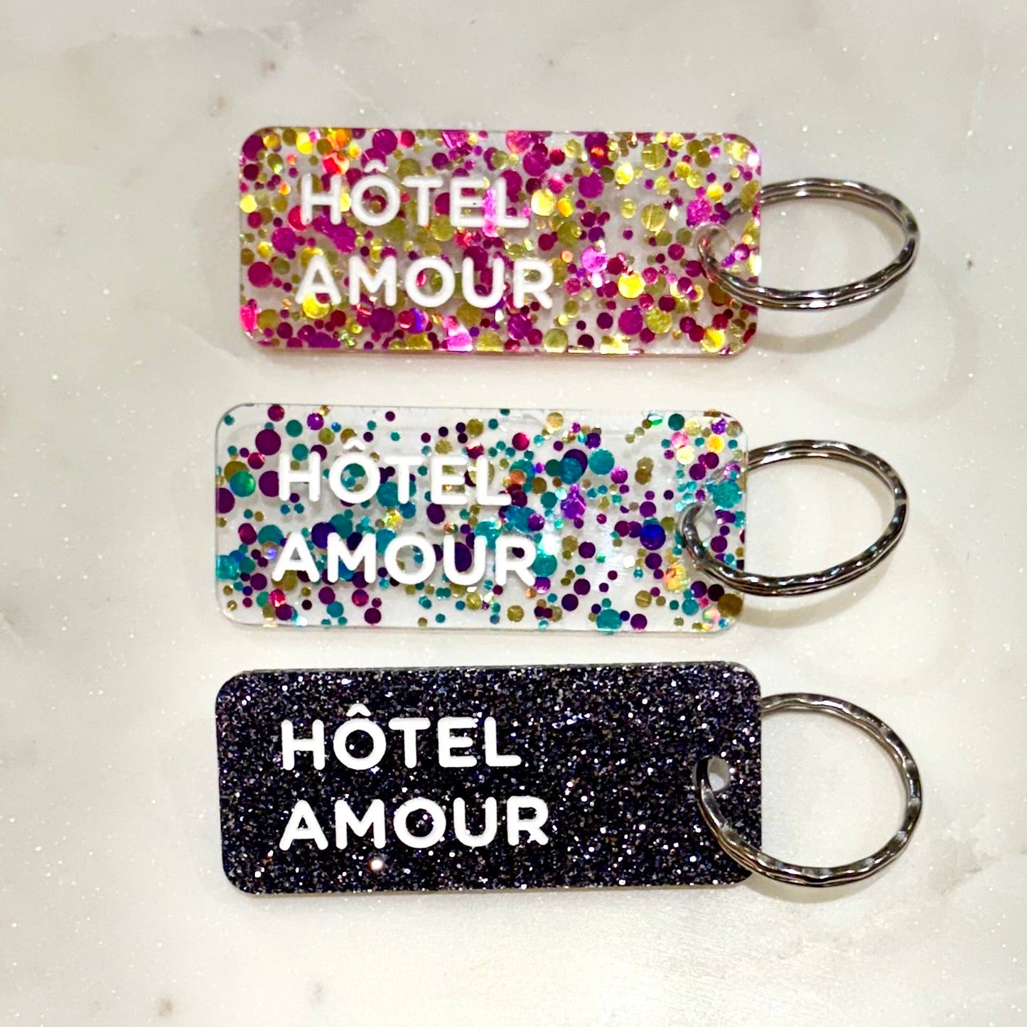 HOTEL AMOUR Porte-clés à paillettes