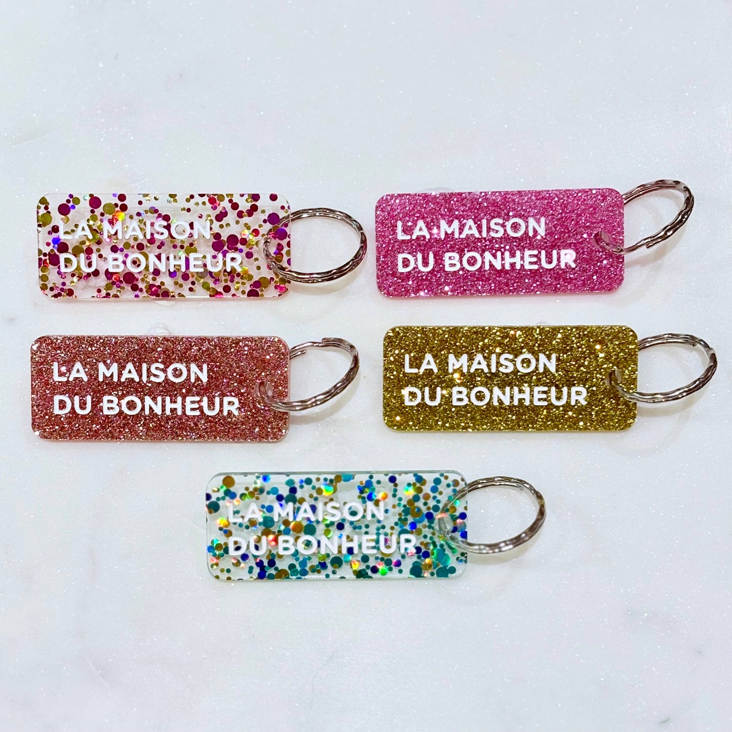 LA MAISON DU BONHEUR Porte-clés à paillettes