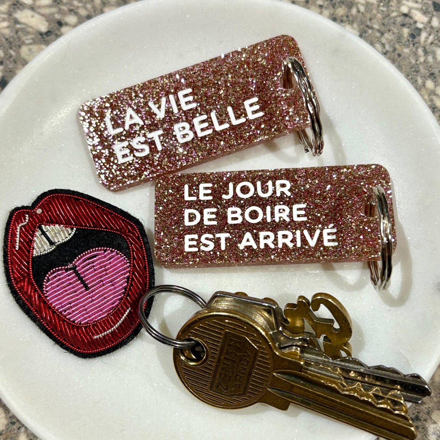 LA VIE EST BELLE Porte-clés à paillettes
