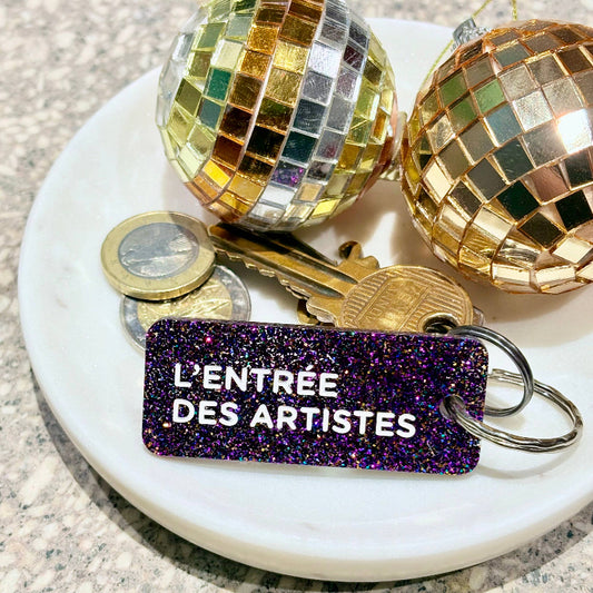 ENTRÉE DES ARTISTES Porte-clés à paillettes