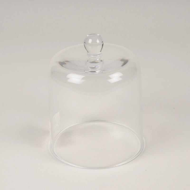 Cloche en verre transparent avec poignée.  Caractéristiques  Matériau : verre Diamètre : 10.5cm Hauteur 13cm